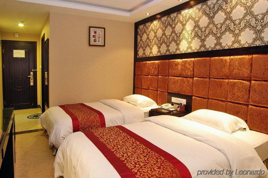 Guangzhou Lucky Hotel Rum bild